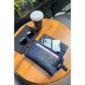 Navy Blue Genuine Leather Unisex Bag: Zippered, Handle and Phone Compartment Design